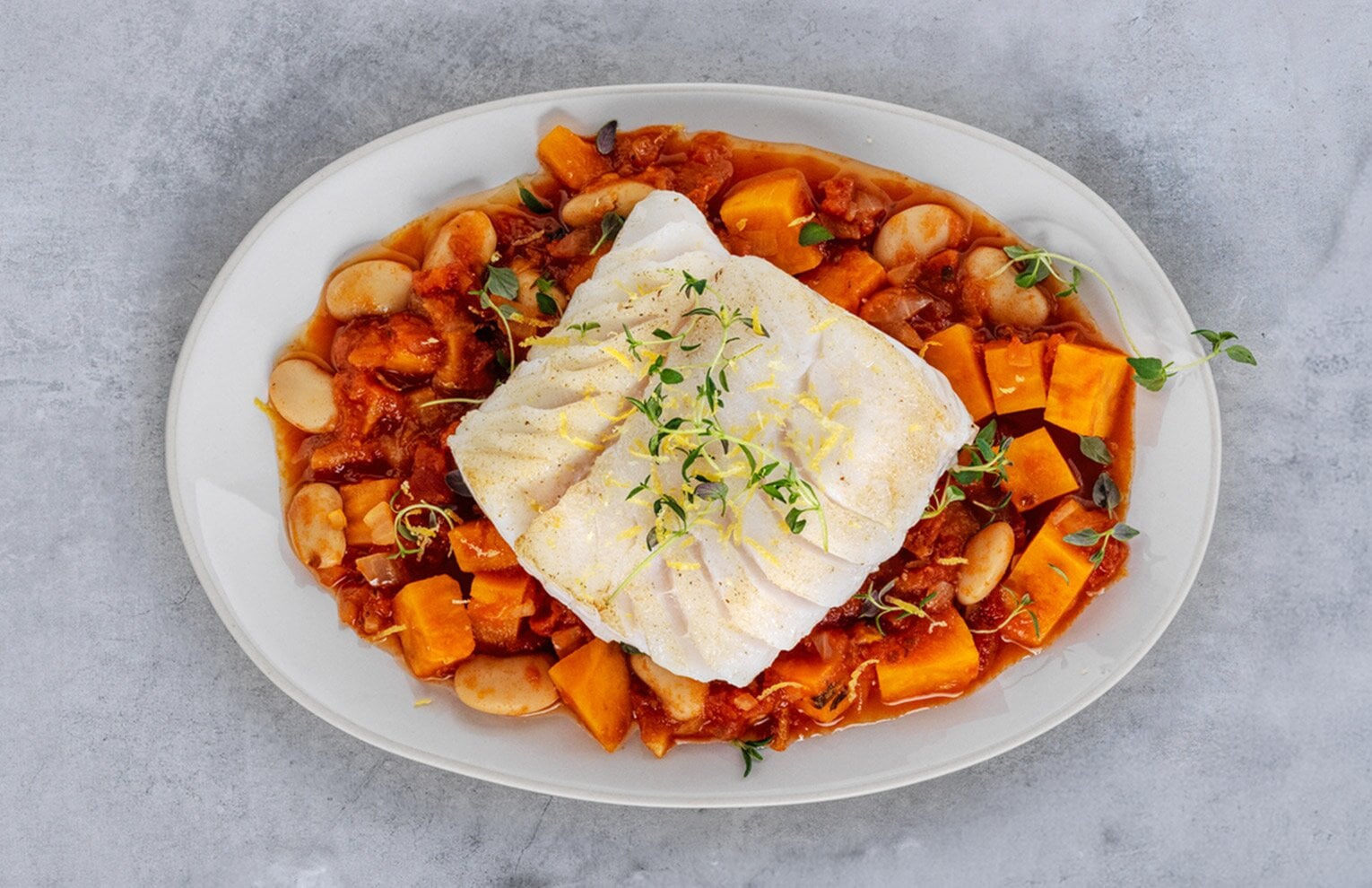 Skrei norvégien poêlé aux haricots, patates douces et thym